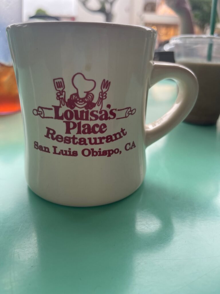 A diner mug from Louisa's Place, a breakfast and lunch restaurant in San Luis Obispo, CA