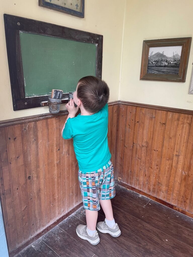 A child plays in the Old West area at the San Luis Obispo Children's Museum