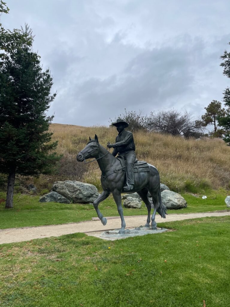 A statue of Alex Madonna on horseback  on the grounds of the Madonna Inn in San Luis Obispo, CA